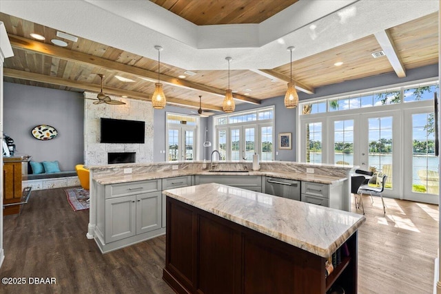 3212 John Anderson Dr, Ormond Beach, FL 32176 - kitchen with a spacious island, wooden ceiling, and french doors
