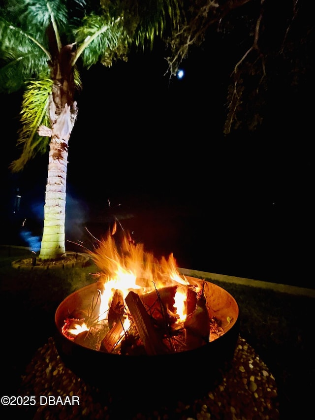 3212 John Anderson Dr, Ormond Beach, FL 32176 - exterior view of an outdoor fire pit