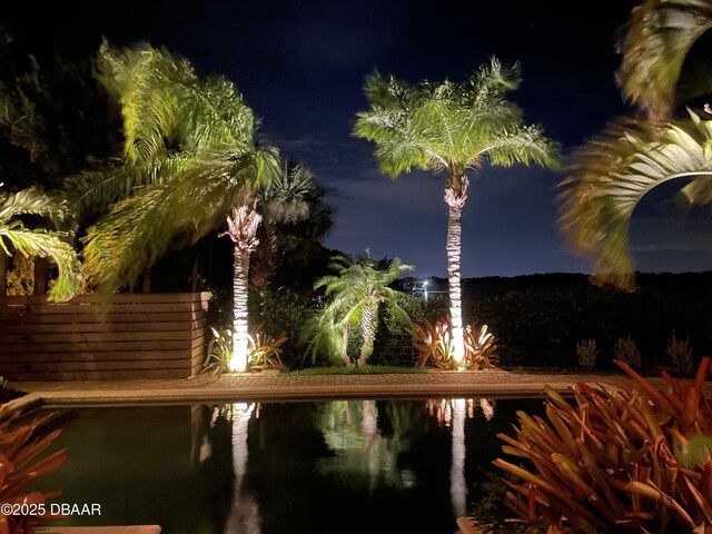 3212 John Anderson Dr, Ormond Beach, FL 32176 - view of pool at night