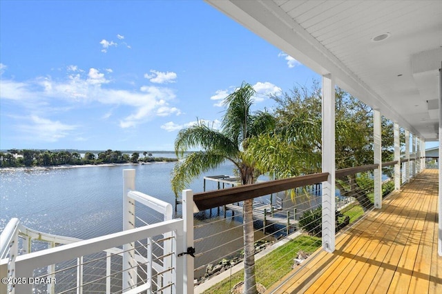 exterior space with a water view