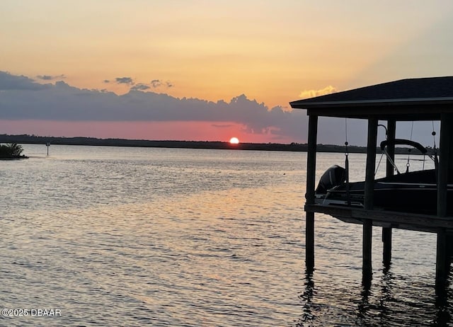 dock area with a water view