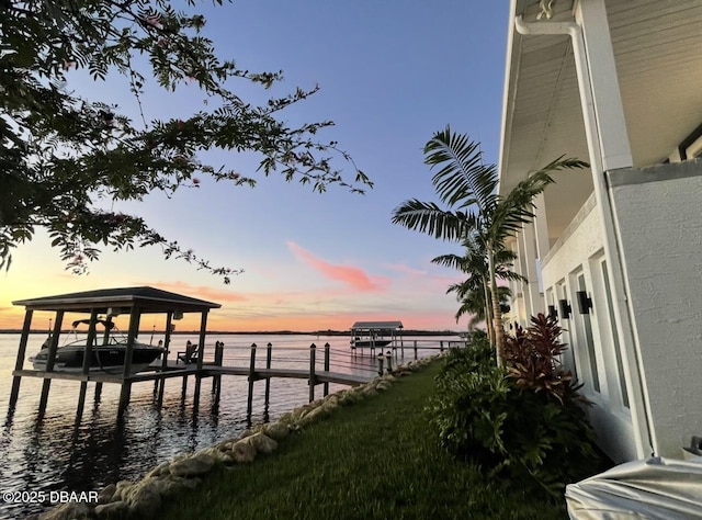 dock area featuring a water view