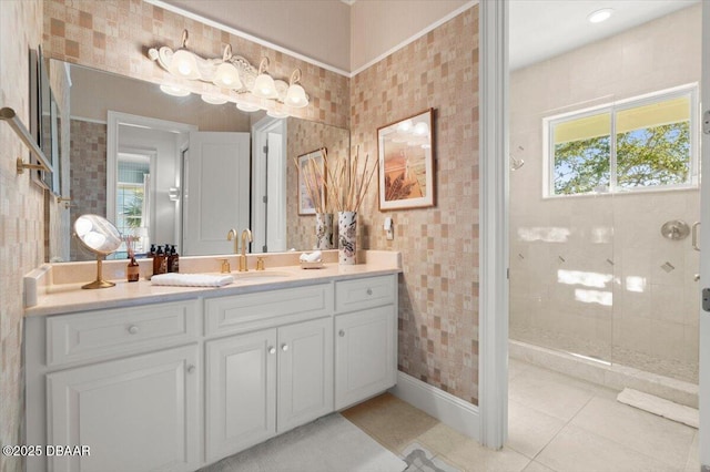 3212 John Anderson Dr, Ormond Beach, FL 32176 - full bath with vanity, plenty of natural light, tile patterned floors, and a tile shower