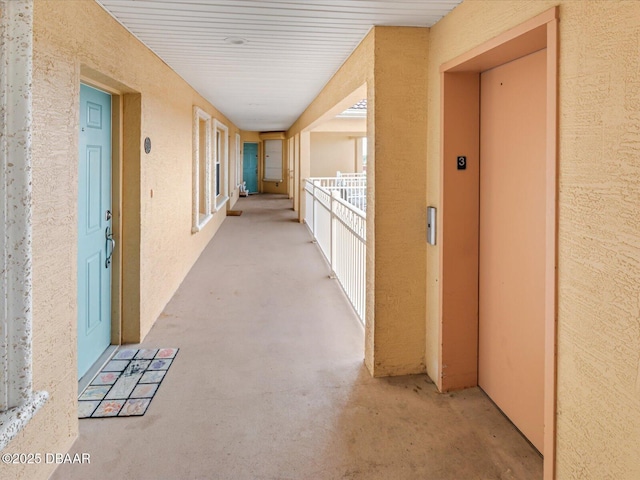 hall featuring elevator