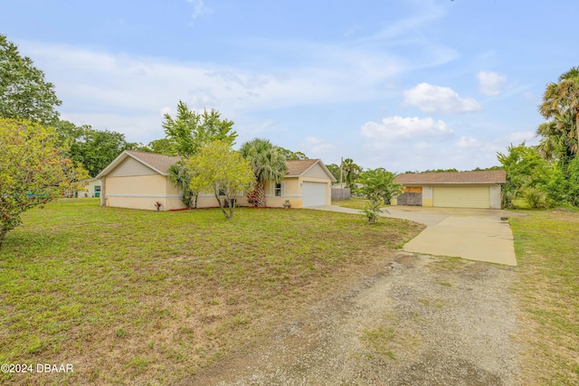 ranch-style house with a front yard and a garage