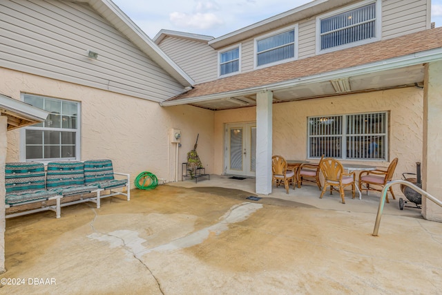 view of patio featuring french doors