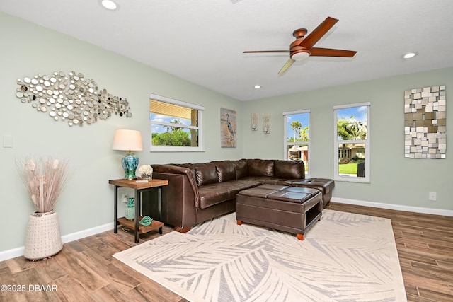 22 Sand Dune Dr, New Smyrna Beach, FL 32169 - living room with wood finished floors, plenty of natural light, ceiling fan, and recessed lighting