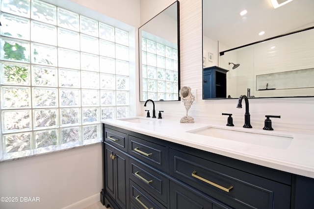 22 Sand Dune Dr, New Smyrna Beach, FL 32169 - bathroom with double vanity and a shower