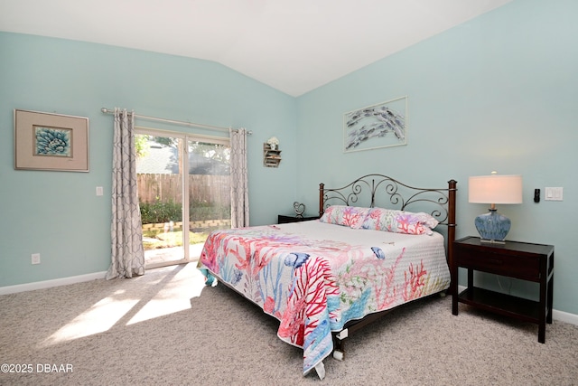 22 Sand Dune Dr, New Smyrna Beach, FL 32169 - carpeted bedroom with access to exterior and vaulted ceiling