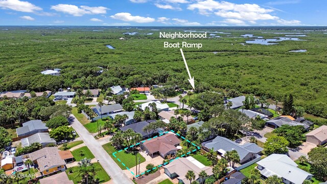 22 Sand Dune Dr, New Smyrna Beach, FL 32169 - aerial overview of property's location featuring property boundaries highlighted and nearby suburban area