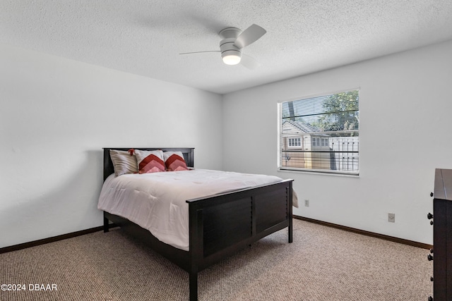 75 Sycamore Cir, Ormond Beach, FL 32174 - carpeted bedroom featuring a textured ceiling and ceiling fan