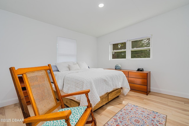 bedroom with light wood-type flooring