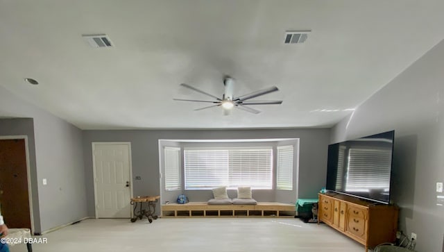 unfurnished living room with light hardwood / wood-style floors and ceiling fan