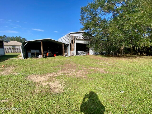 view of yard featuring a carport