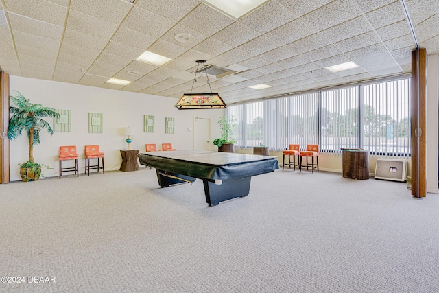 rec room with carpet flooring, floor to ceiling windows, a drop ceiling, and billiards