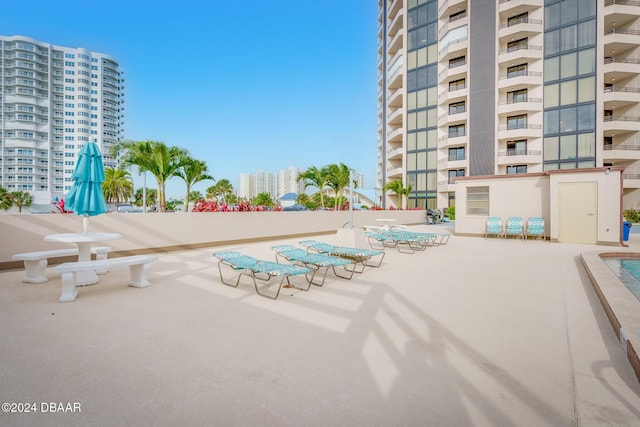 view of swimming pool with a patio area