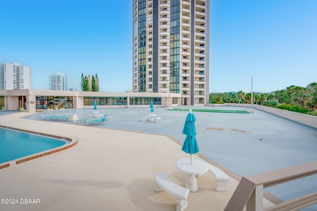 view of pool featuring a patio