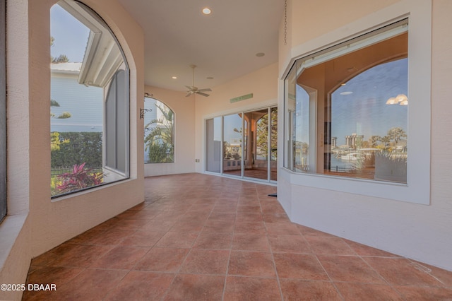 interior space with tile patterned floors and recessed lighting