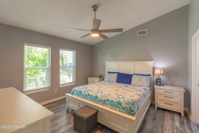 3324 Royal Palm Dr, Edgewater, FL 32141 - bedroom with dark wood-style floors, vaulted ceiling, and a ceiling fan