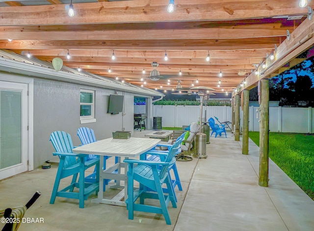 3324 Royal Palm Dr, Edgewater, FL 32141 - fenced backyard featuring outdoor dining area and a patio