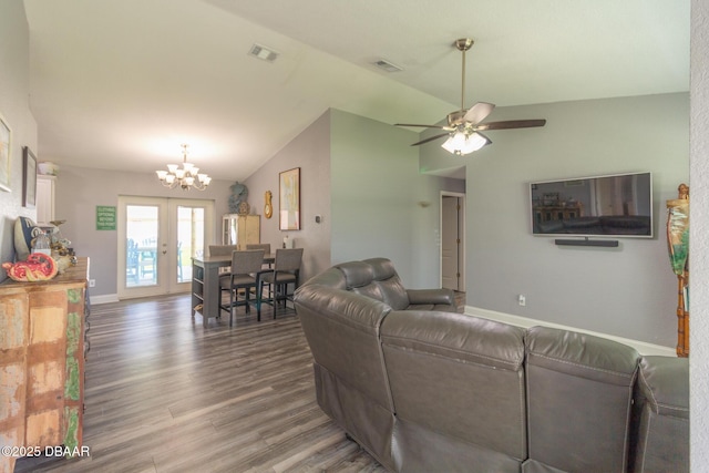 3324 Royal Palm Dr, Edgewater, FL 32141 - living area featuring a chandelier, vaulted ceiling, wood finished floors, ceiling fan, and french doors