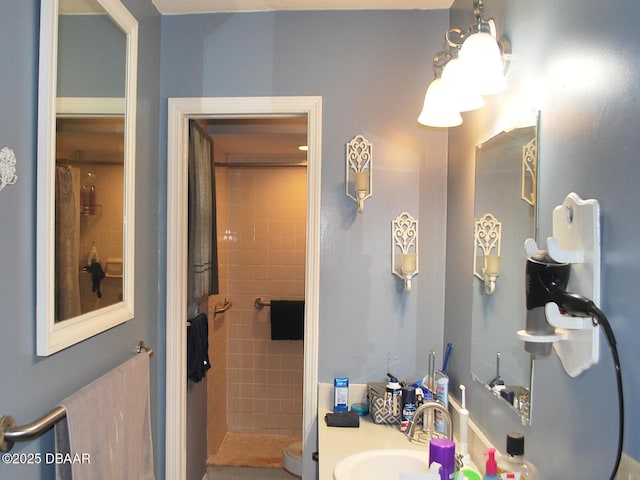 full bath featuring a shower stall, toilet, and vanity