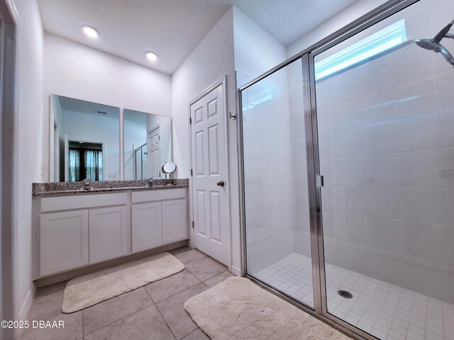 3107 Crab Trap Dr, New Smyrna Beach, FL 32168 - full bath with a stall shower, vanity, and tile patterned flooring