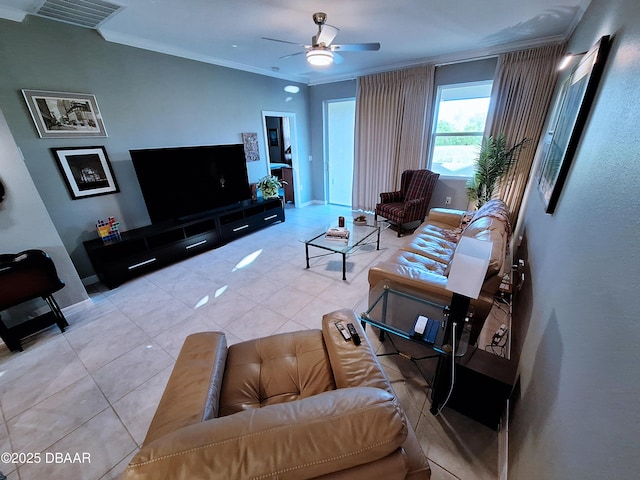 3107 Crab Trap Dr, New Smyrna Beach, FL 32168 - living room featuring light tile patterned floors, crown molding, a ceiling fan, and baseboards