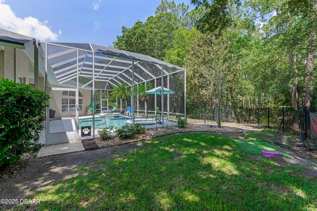 view of yard with an outdoor pool, glass enclosure, and a patio area