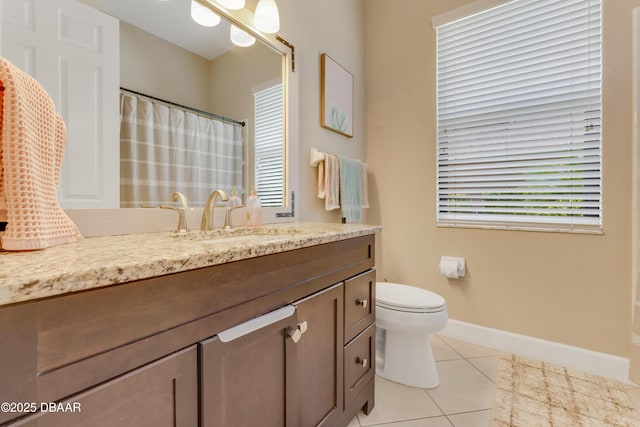 full bath with tile patterned flooring, toilet, vanity, baseboards, and a shower with shower curtain