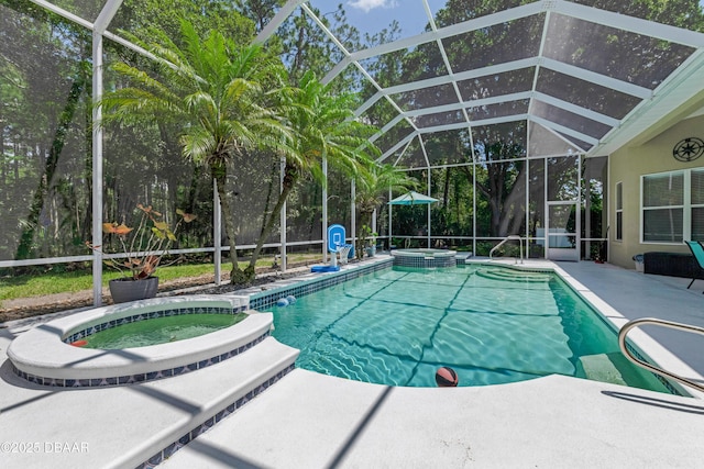 view of pool with a pool with connected hot tub, a patio area, and a lanai