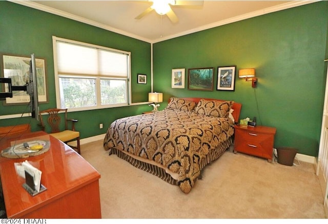 bedroom with ornamental molding, carpet floors, and ceiling fan