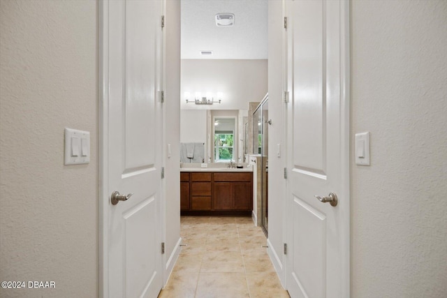 bathroom featuring vanity and tile patterned floors