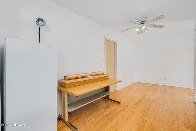 dining room featuring ceiling fan and light wood-type flooring