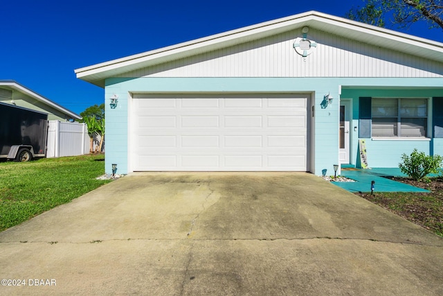 garage with a yard