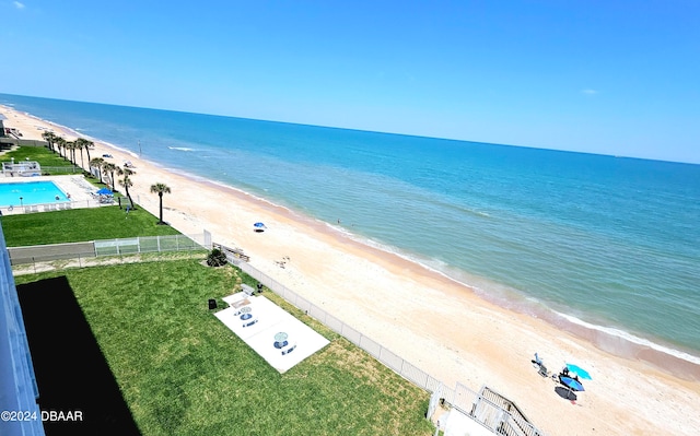 drone / aerial view with a view of the beach and a water view