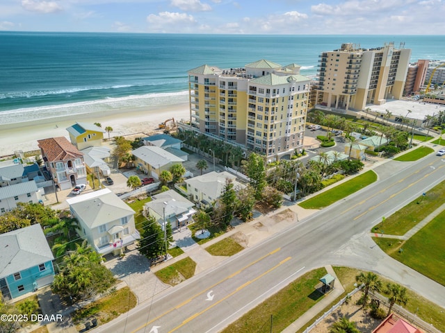 bird's eye view with a view of the beach and a water view