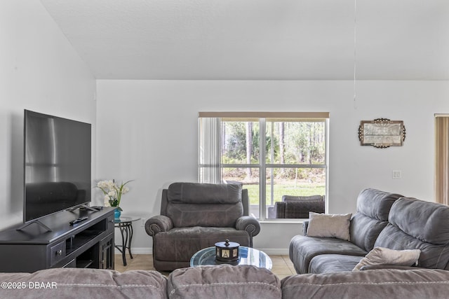 tiled living area with baseboards