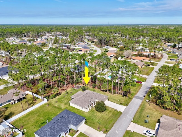 birds eye view of property with a residential view