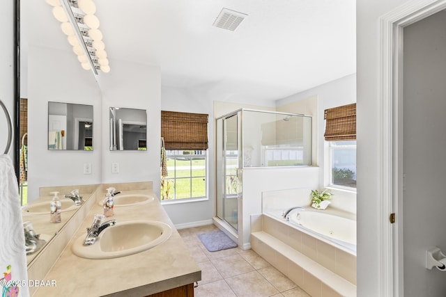 full bathroom featuring visible vents, a sink, and a shower stall