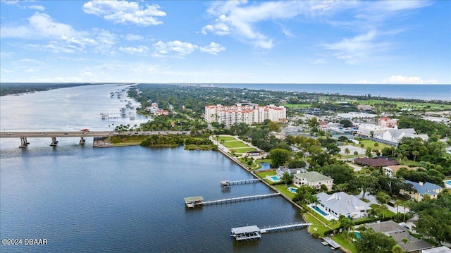 birds eye view of property featuring a water view