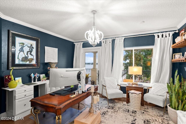 home office featuring hardwood / wood-style flooring, a healthy amount of sunlight, and crown molding