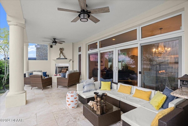 view of patio with ceiling fan, outdoor lounge area, and french doors