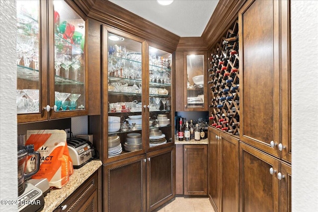 wine cellar featuring a textured ceiling