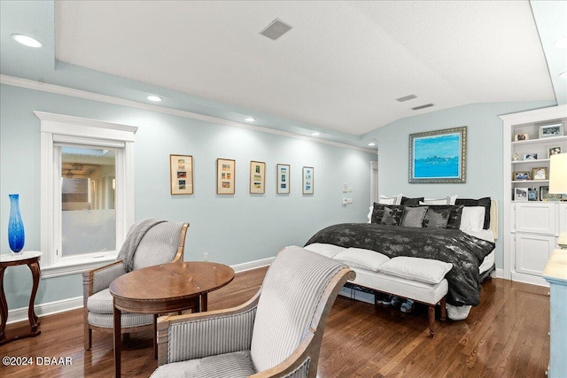 bedroom featuring ornamental molding, dark hardwood / wood-style flooring, and lofted ceiling