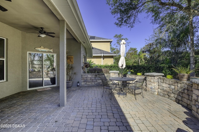 view of patio / terrace with ceiling fan