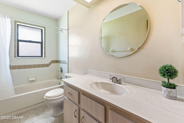 104 Herring Gull Ct, Daytona Beach, FL 32119 - full bathroom featuring shower / bath combo with shower curtain, vanity, tile patterned flooring, and a textured ceiling