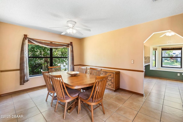 104 Herring Gull Ct, Daytona Beach, FL 32119 - dining area featuring ceiling fan, light tile patterned flooring, and a textured ceiling