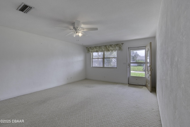 34 Kathy Dr, Ormond Beach, FL 32176 - spare room with ceiling fan and light carpet