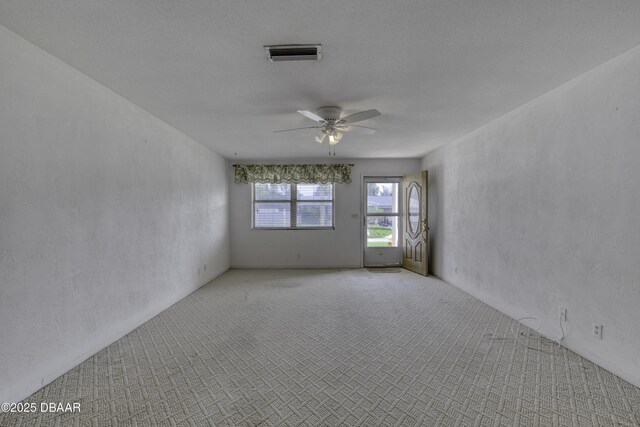 34 Kathy Dr, Ormond Beach, FL 32176 - unfurnished room featuring ceiling fan and light colored carpet